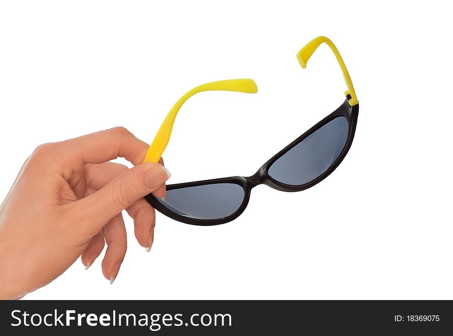 Woman holding stylish and trendy sunglasses in the hand for eyes protection. Woman holding stylish and trendy sunglasses in the hand for eyes protection