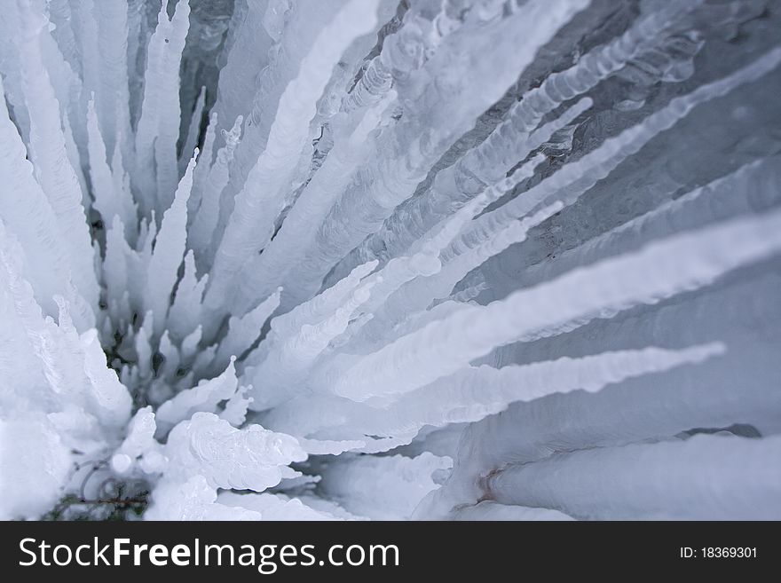 Close view of blue icicles background in cold light