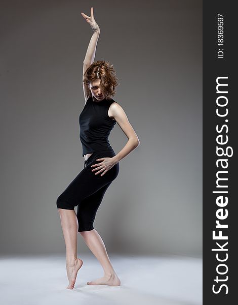 Photo of attractive young woman dancing. Photo of attractive young woman dancing