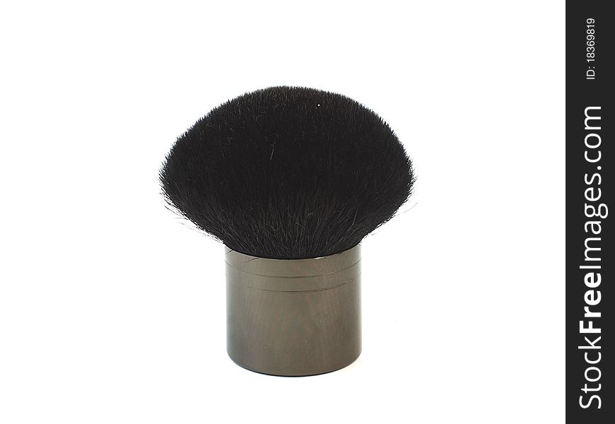 Cosmetic brush on white background