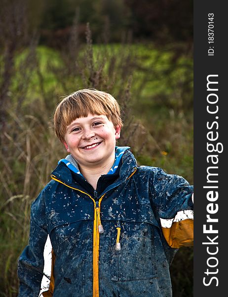 Child loves to race with a quad bike at the muddy quad track