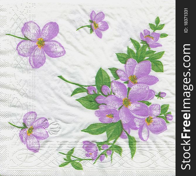 A close up of a purple flowering paper napkin