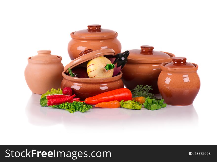 Brown ceramic ware on a white background. Brown ceramic ware on a white background.