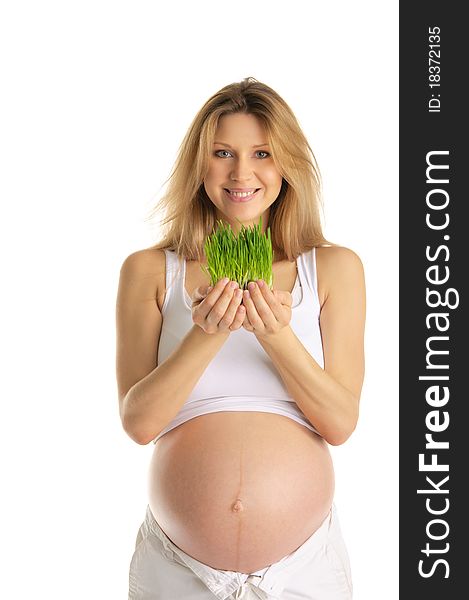 Pregnant Woman Holding Green Grass