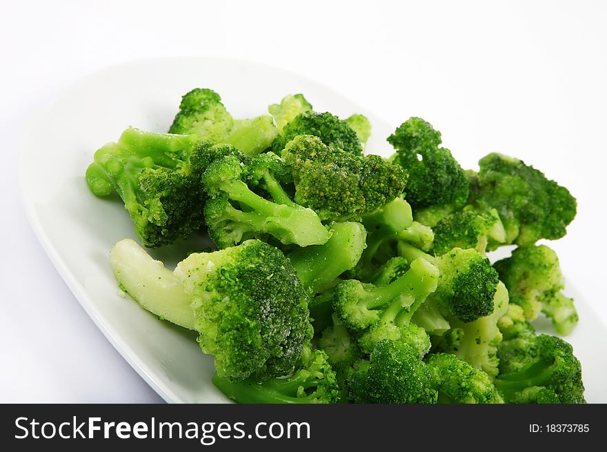 Fresh frozen broccoli on a plate