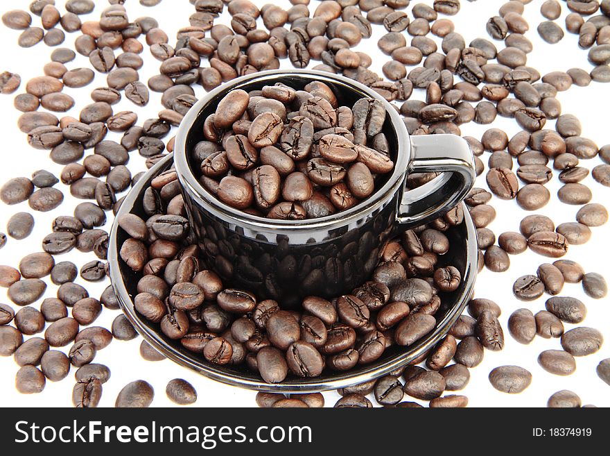 Coffee cup with coffee beans. Coffee cup with coffee beans.