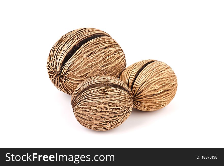 Three dried Pong-pong fruits on white background