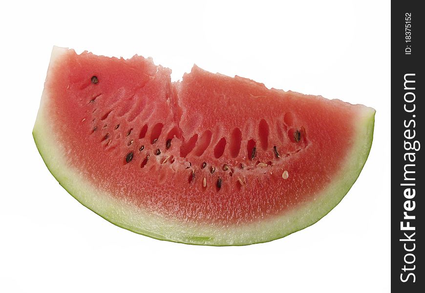 A big juicy slice of watermelon isolated on white with shadow.