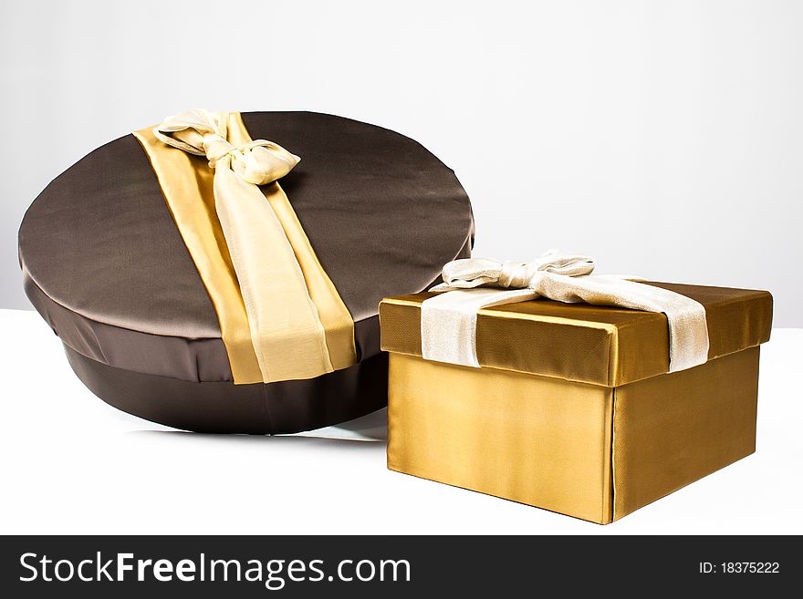 Gold, brown gift boxes for holiday. Gold, brown gift boxes for holiday