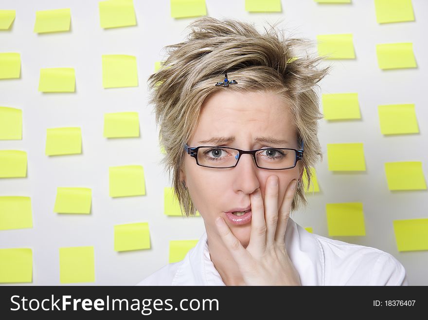Portrait of business woman with note papers on white background