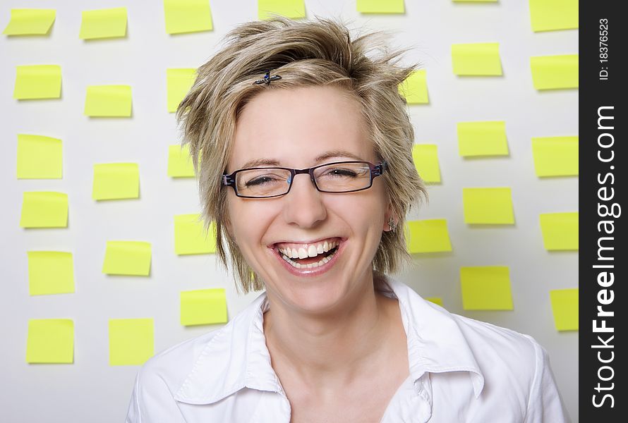 Portrait of business woman with note papers on white background