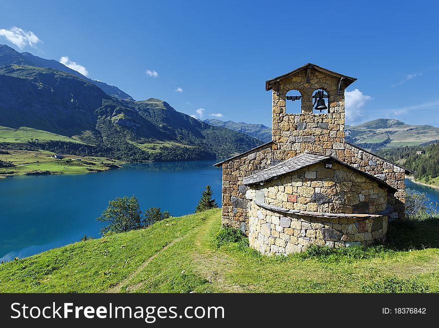 Chapel and lake in french mountain. Chapel and lake in french mountain