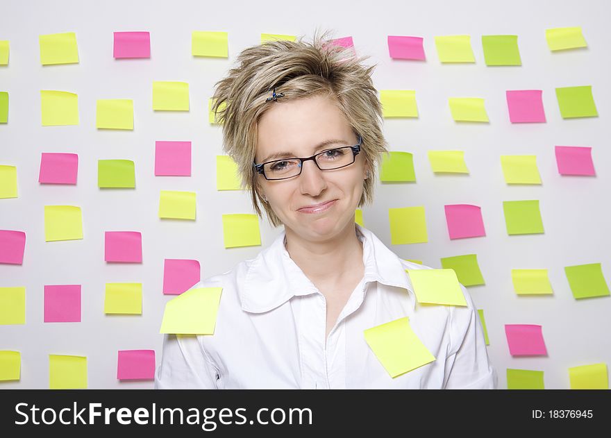 Portrait of business woman with note papers