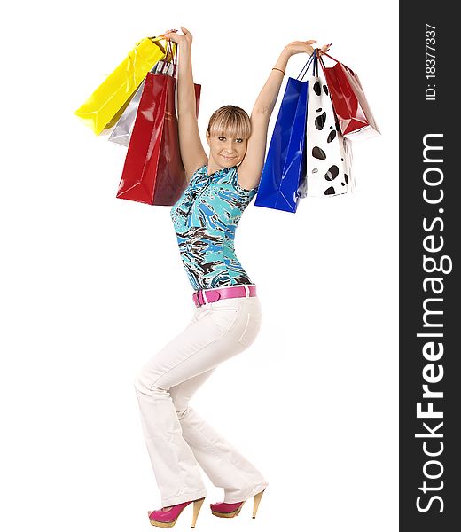 Portrait young adult girl with colored bags. Portrait young adult girl with colored bags