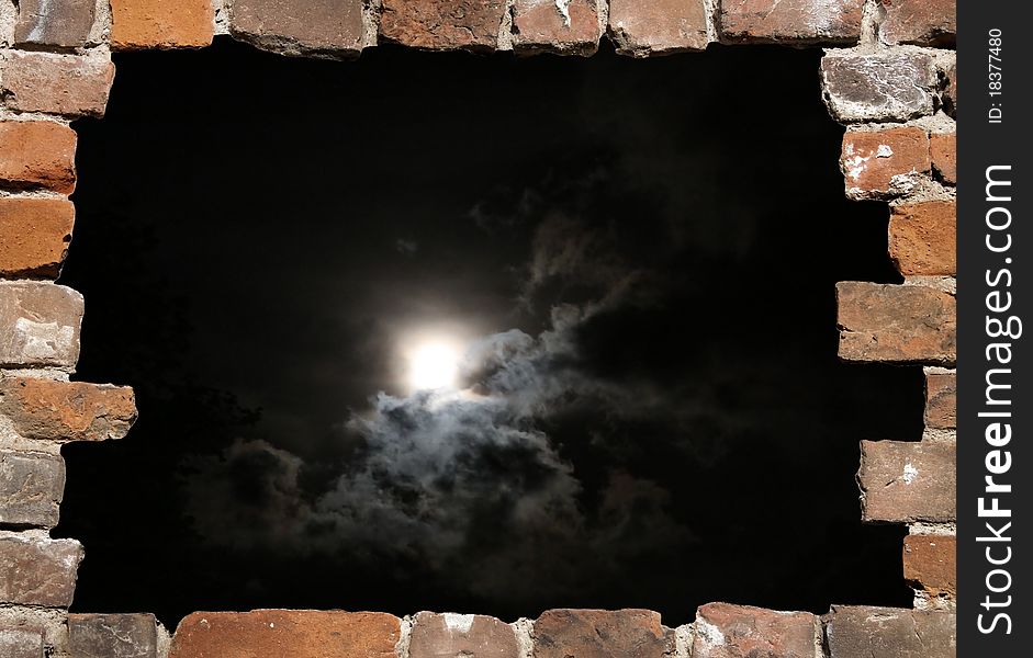 Old brick wall as a grungy frame, isolated on night sky background. Old brick wall as a grungy frame, isolated on night sky background