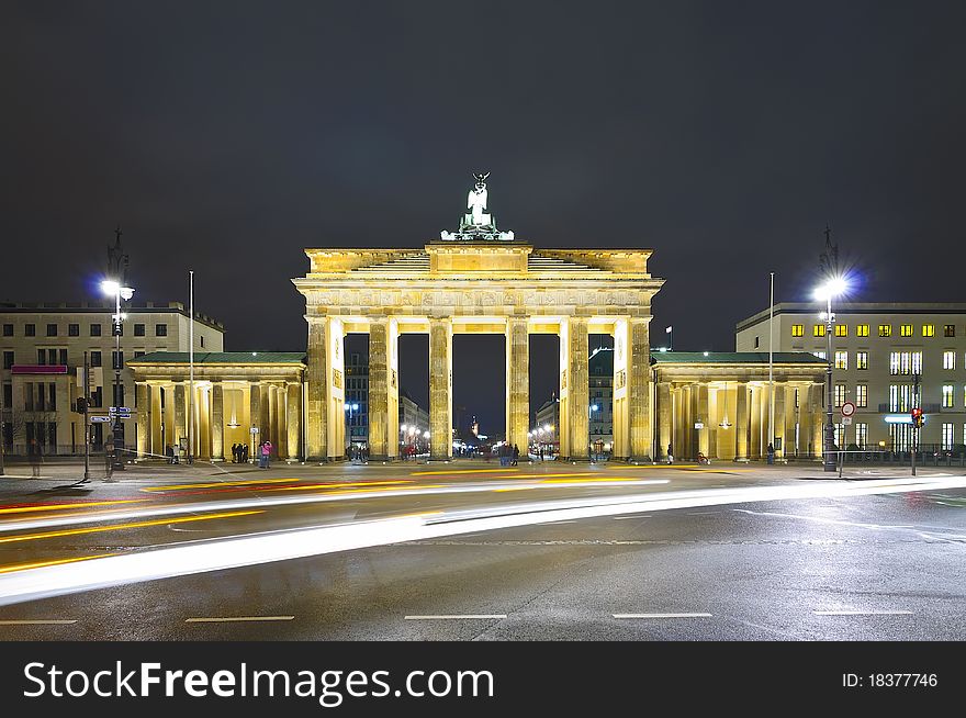 Traffic at night, brandenburger gate, berlin, germany