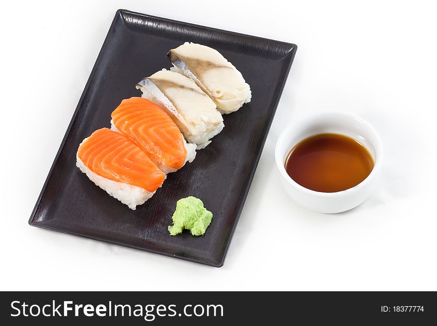 Salmon and Saba sushi with wasabi and japanese sauce. Salmon and Saba sushi with wasabi and japanese sauce