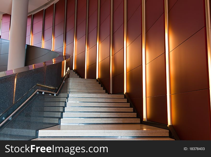 This is a grand staircase with red background.