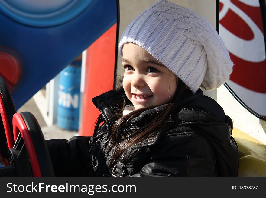 Portrait of a cute little girl smiling