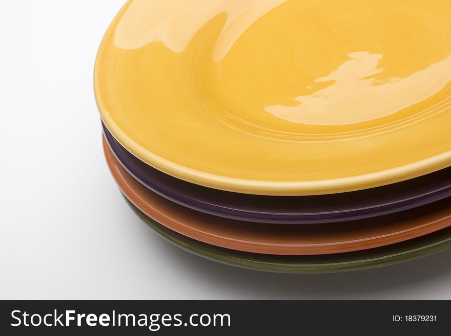 Colorful ceramic plates for the main dishes.