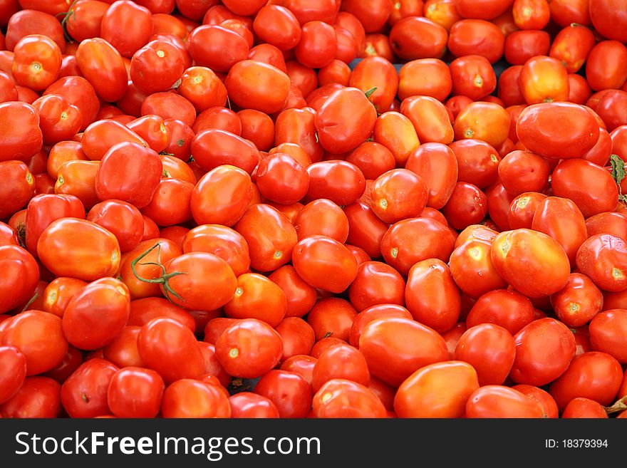 The picture of fresh red tomatoes. The picture of fresh red tomatoes.
