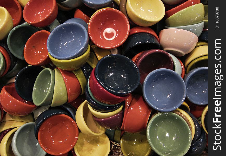 Heap of colored coffee cups