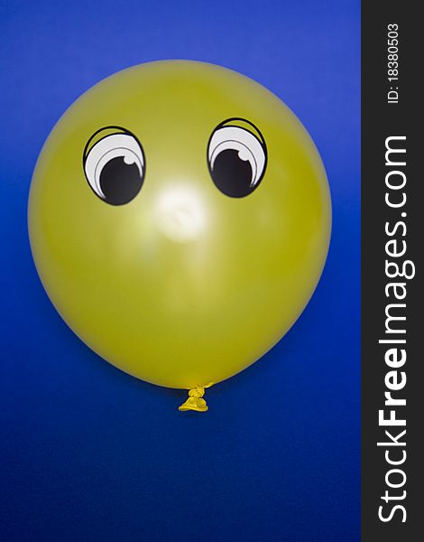 This is a balloon with a face. This is a balloon with a face