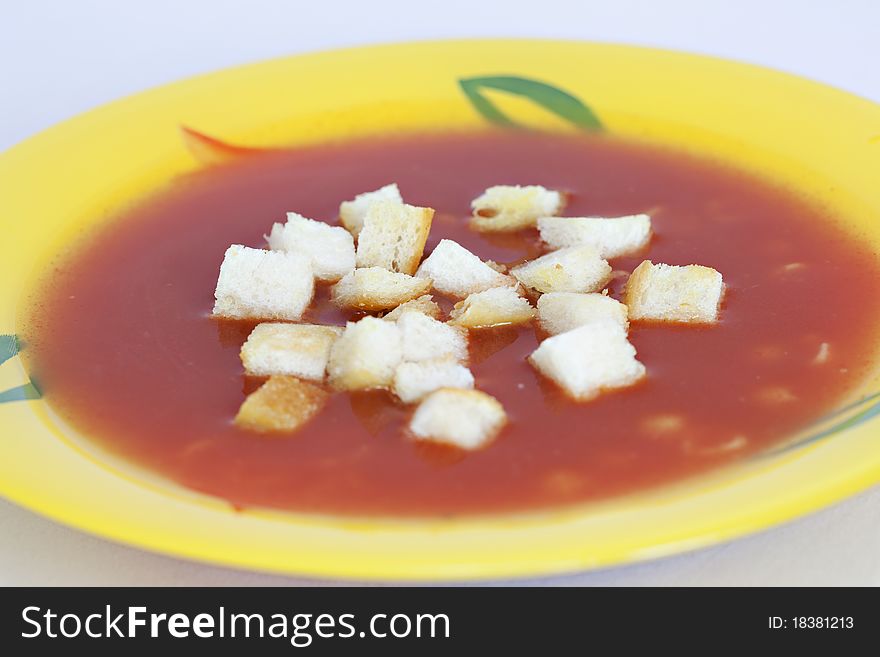 Closeup of bowl of delicious tomato soup