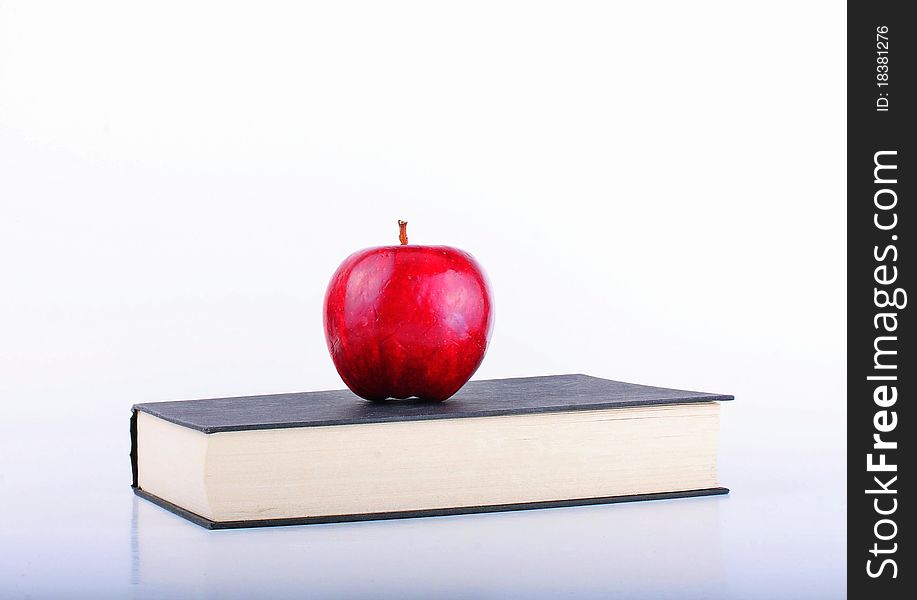 Apple On A Book