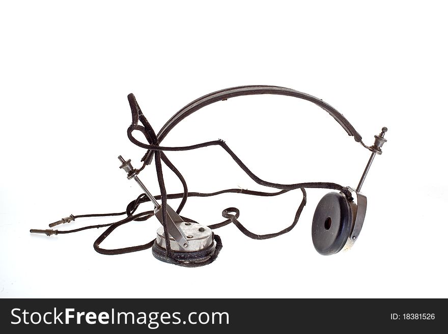 Old historic headphone on white background. Old historic headphone on white background