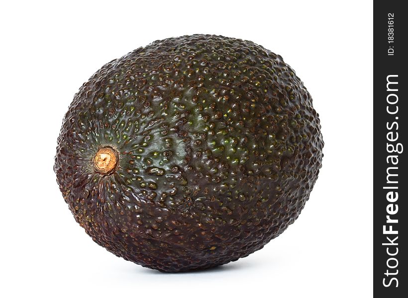 Whole avocado on white background