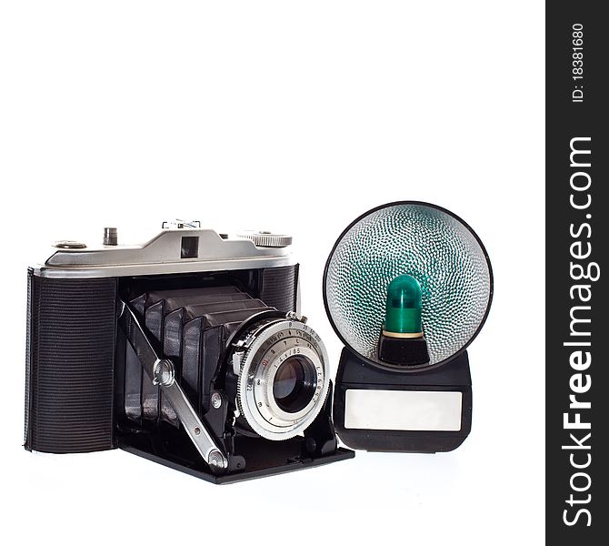 Historic photocamera with flash on white background. Historic photocamera with flash on white background