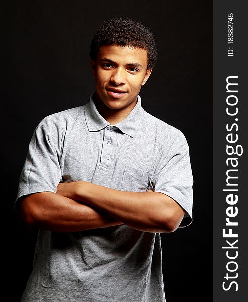 Closeup portrait of a handsome young man over a white background