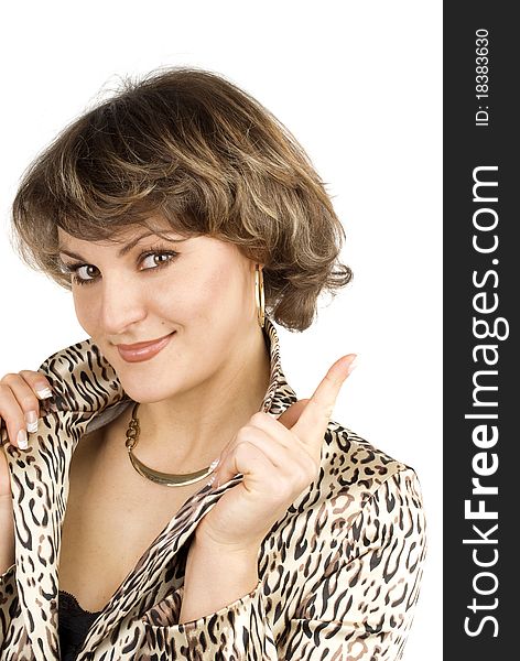 Portrait of attractive young woman in leopard suite isolated on the white. She sows attention signal of finger. Portrait of attractive young woman in leopard suite isolated on the white. She sows attention signal of finger.
