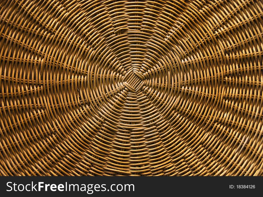 Close-up of handwoven circular basketry. Close-up of handwoven circular basketry