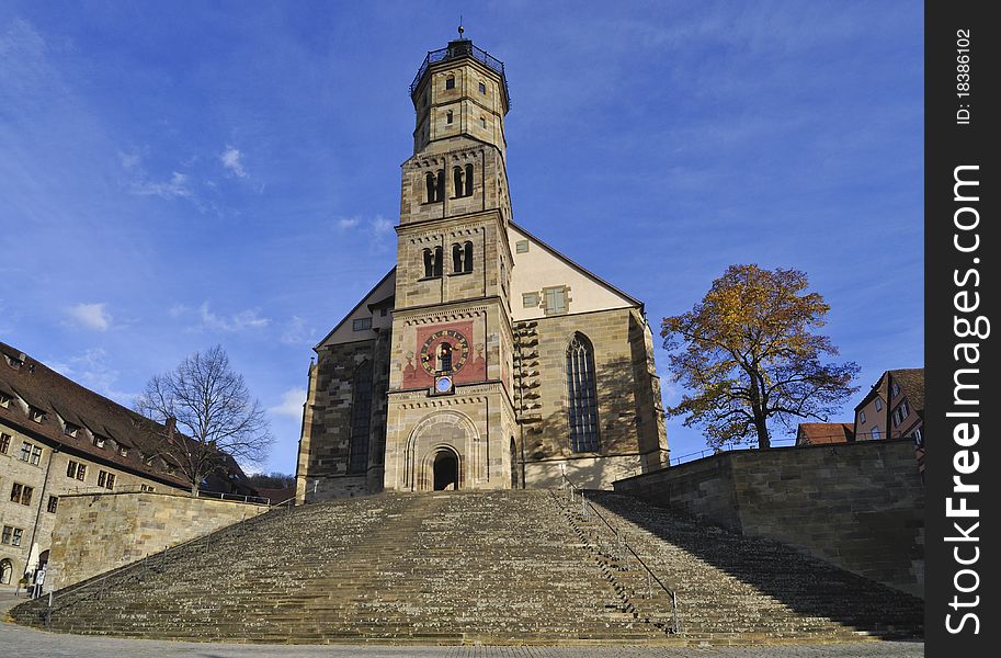 Prominently sitting at the top of a hill, St Martin's church at Schwaebisch Hall in the Kocher valley in Germany is a fine example of medieval church architecture. Prominently sitting at the top of a hill, St Martin's church at Schwaebisch Hall in the Kocher valley in Germany is a fine example of medieval church architecture.