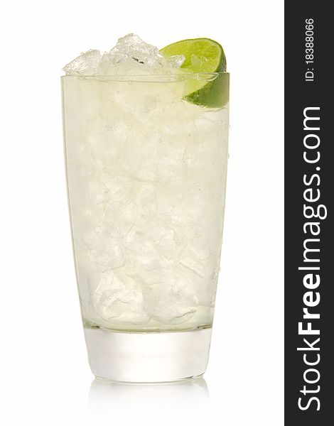Cocktail with lime and Ice isolation on a white