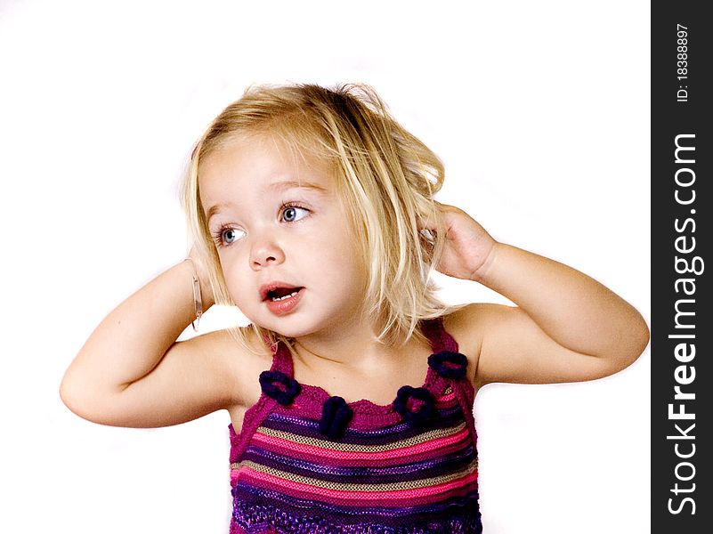 Pretty young girl playing with her hair