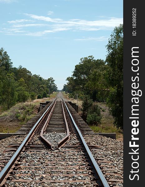 A rail bridge over the local creek. A rail bridge over the local creek