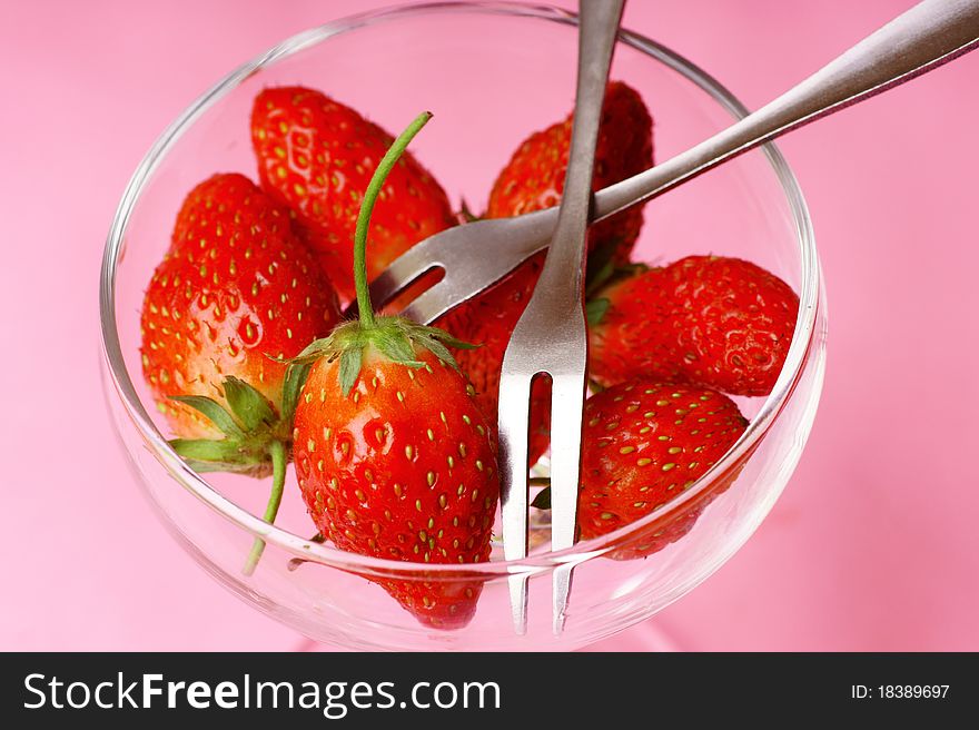 Take a strawberry - use forks