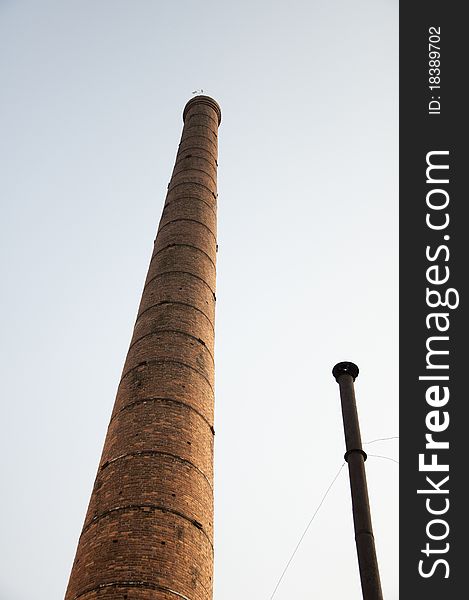 Brick chimney and metal chimney,architecture