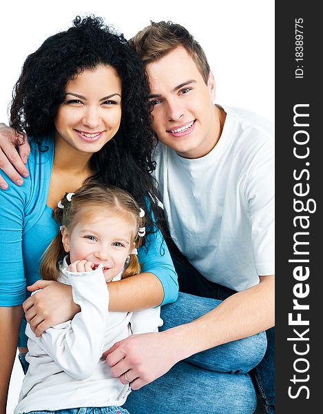 Happy family with a baby on a white background