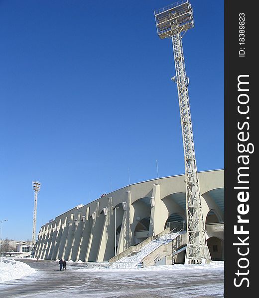 Stadium in the winter against the blue sky