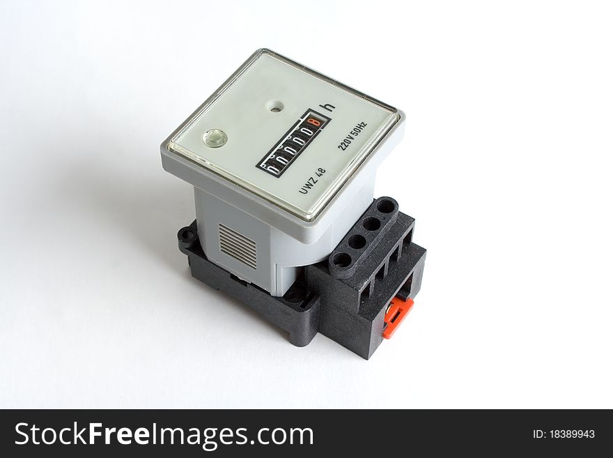 Photo from DIN rail mountable hour meter, white background.