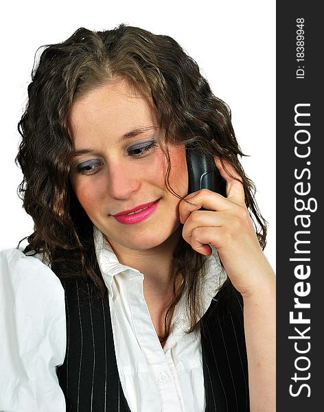 Portrait of smiling casual business woman looking away while on a call