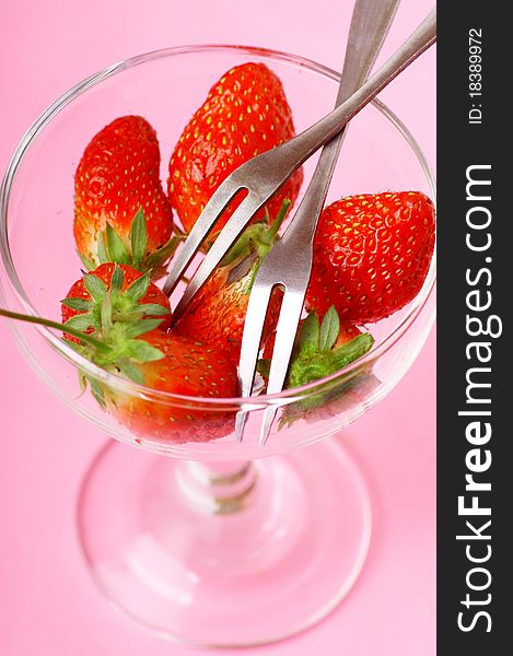 Take a strawberry - use forks