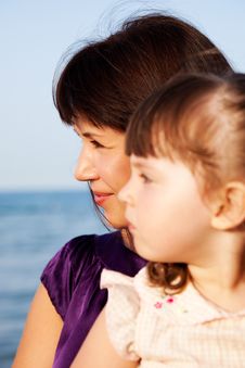 Mother With A Daughter Look Aside Stock Images