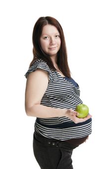 Pregnant Woman Holding Green Apple Stock Photos Pregnant Woman Holding Green Apple Stock Photos