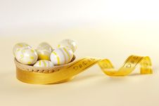Easter Basket, Eggs And Gold Ribbon Stock Images Easter Basket, Eggs And Gold Ribbon Stock Images