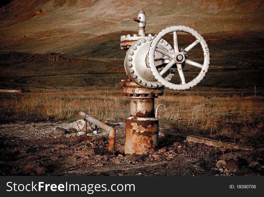 Old rusty valve on Iceland. Old rusty valve on Iceland